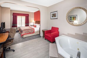 Deluxe Studio Suite, 1 King Bed, Non Smoking | Desk, laptop workspace, iron/ironing board, free cribs/infant beds