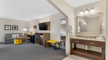 Premium bedding, desk, laptop workspace, blackout curtains