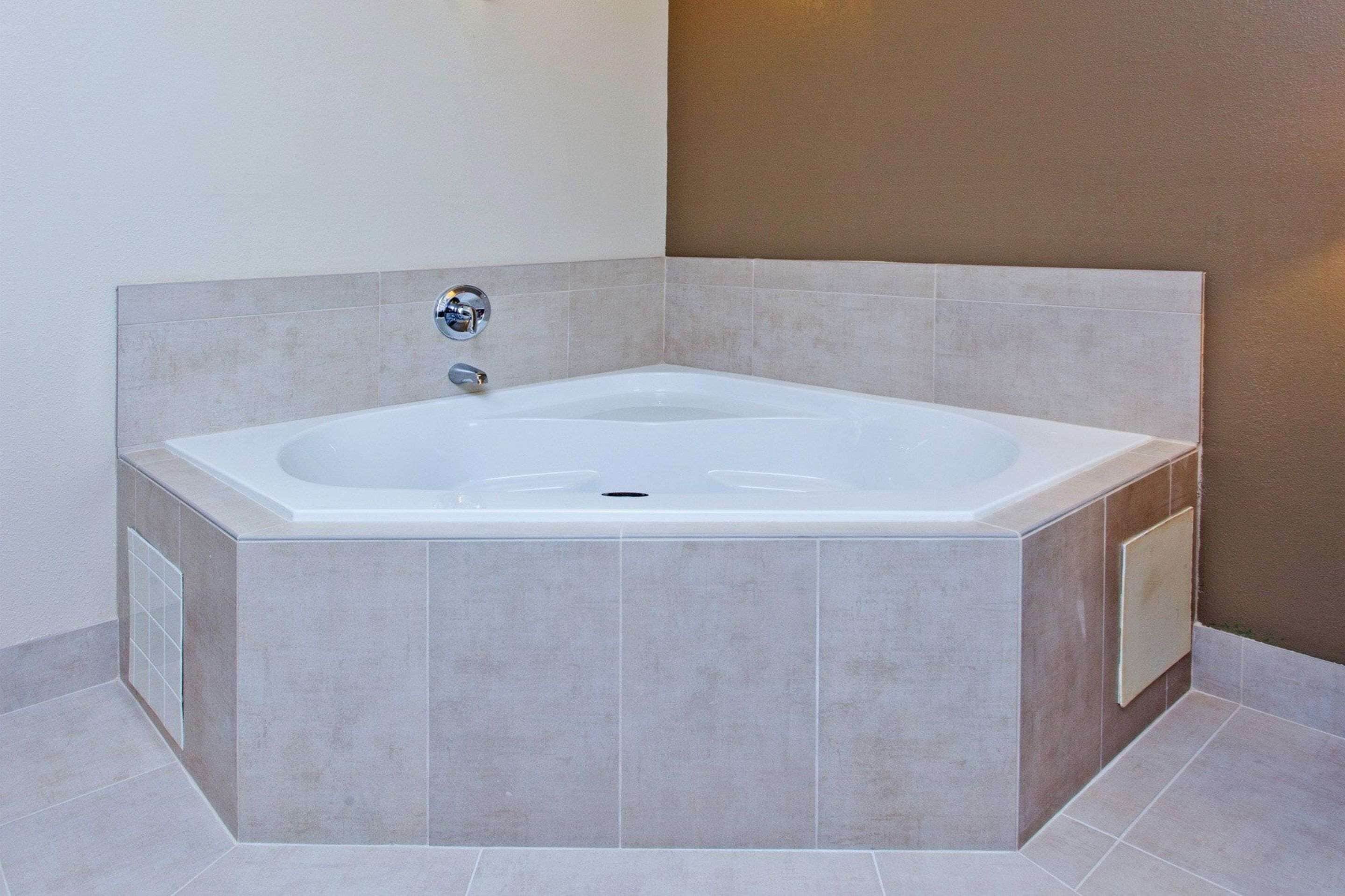 premium bedding, desk, laptop workspace, blackout curtains