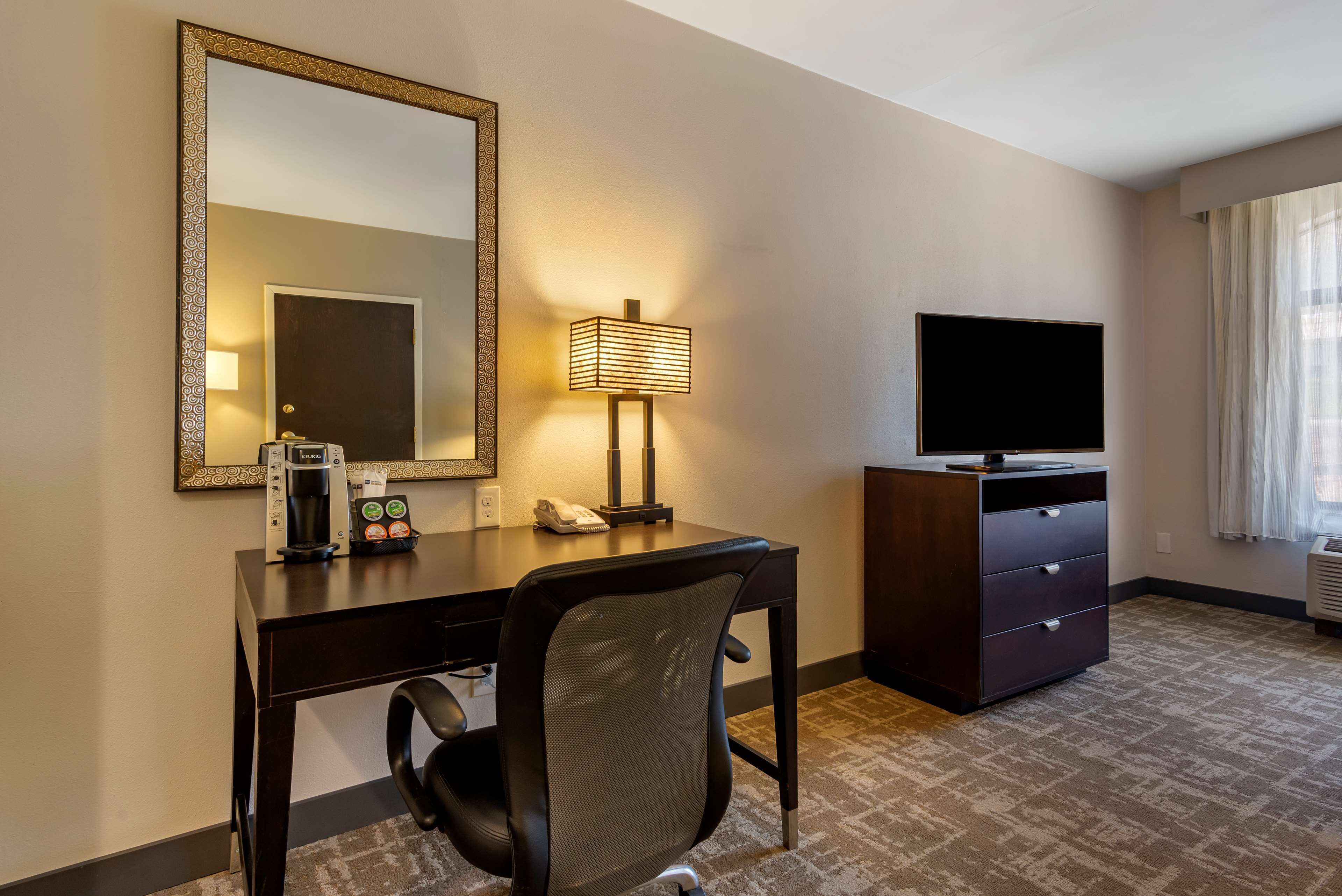 standard room, 1 king bed, non smoking, refrigerator & microwave | premium bedding, laptop workspace, iron/ironing board