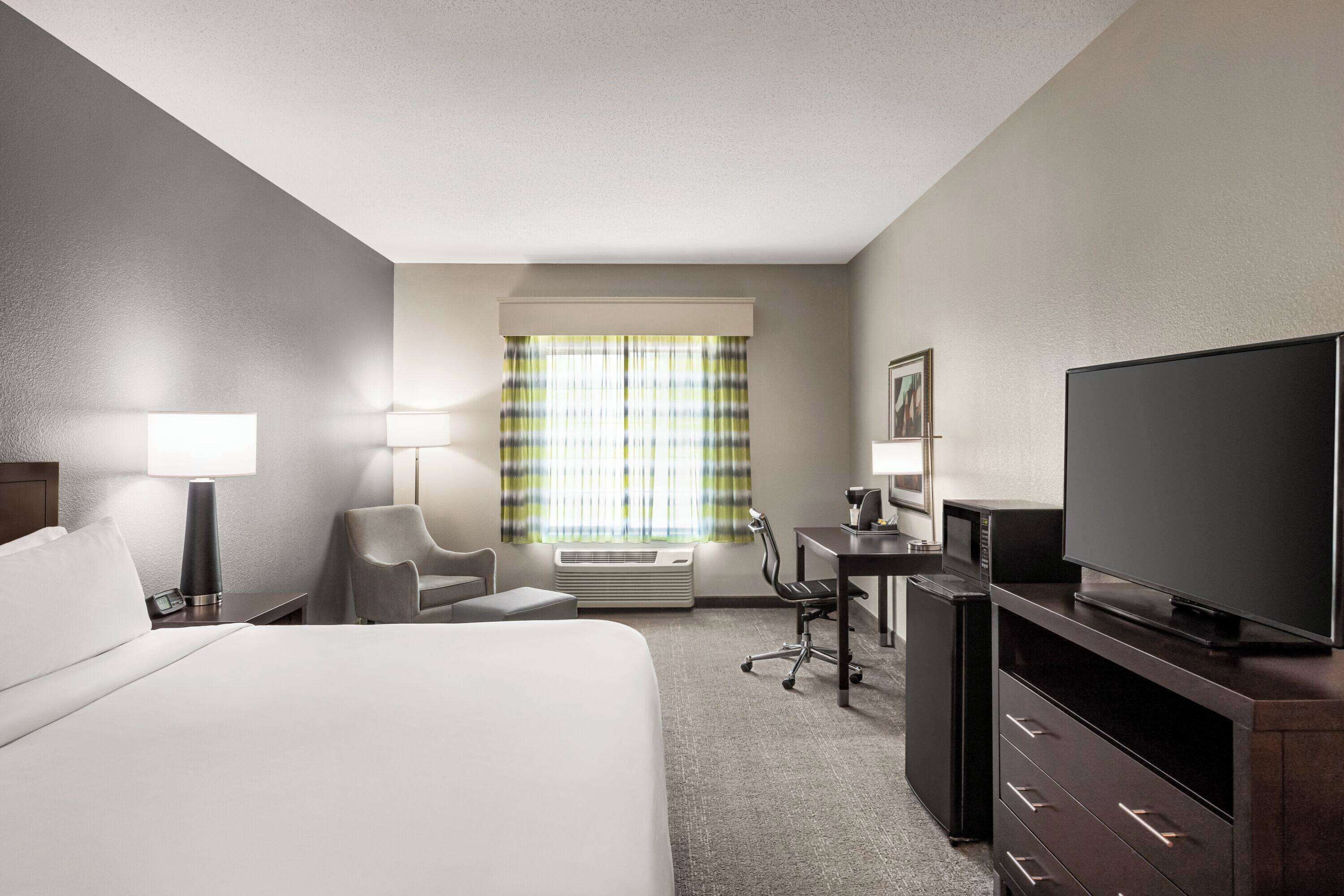 1 bedroom, desk, laptop workspace, blackout curtains