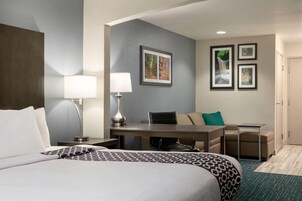 Deluxe Suite, 1 King Bed, Non Smoking | Premium bedding, desk, blackout drapes, iron/ironing board