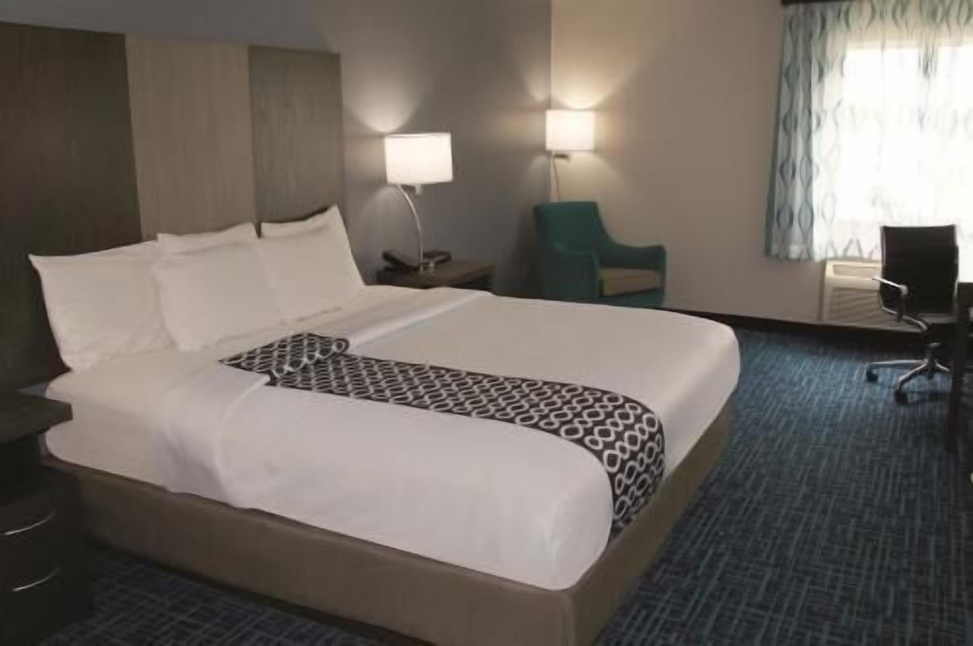 Premium bedding, desk, blackout drapes, iron/ironing board