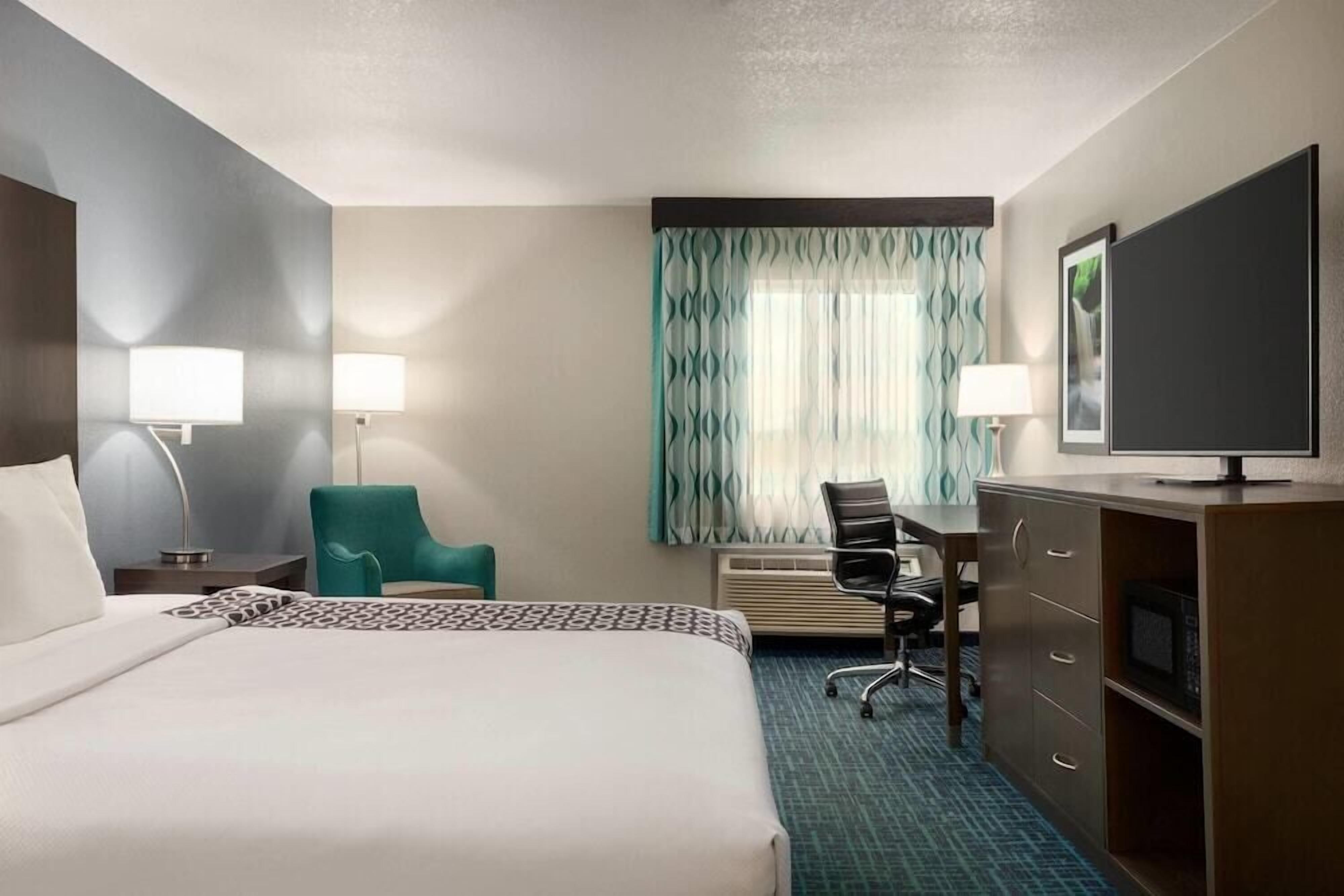 Premium bedding, desk, blackout drapes, iron/ironing board