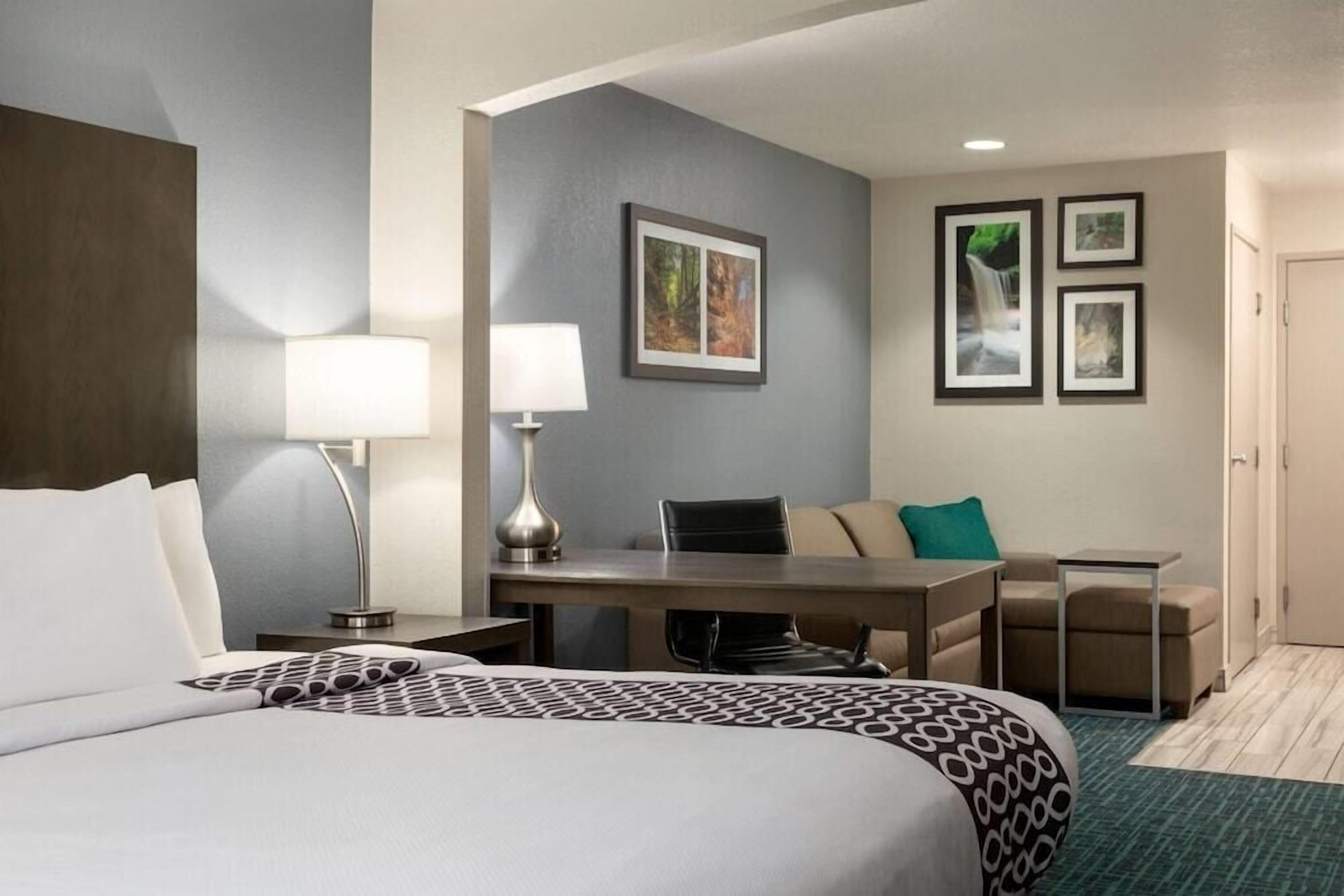 Premium bedding, desk, blackout drapes, iron/ironing board