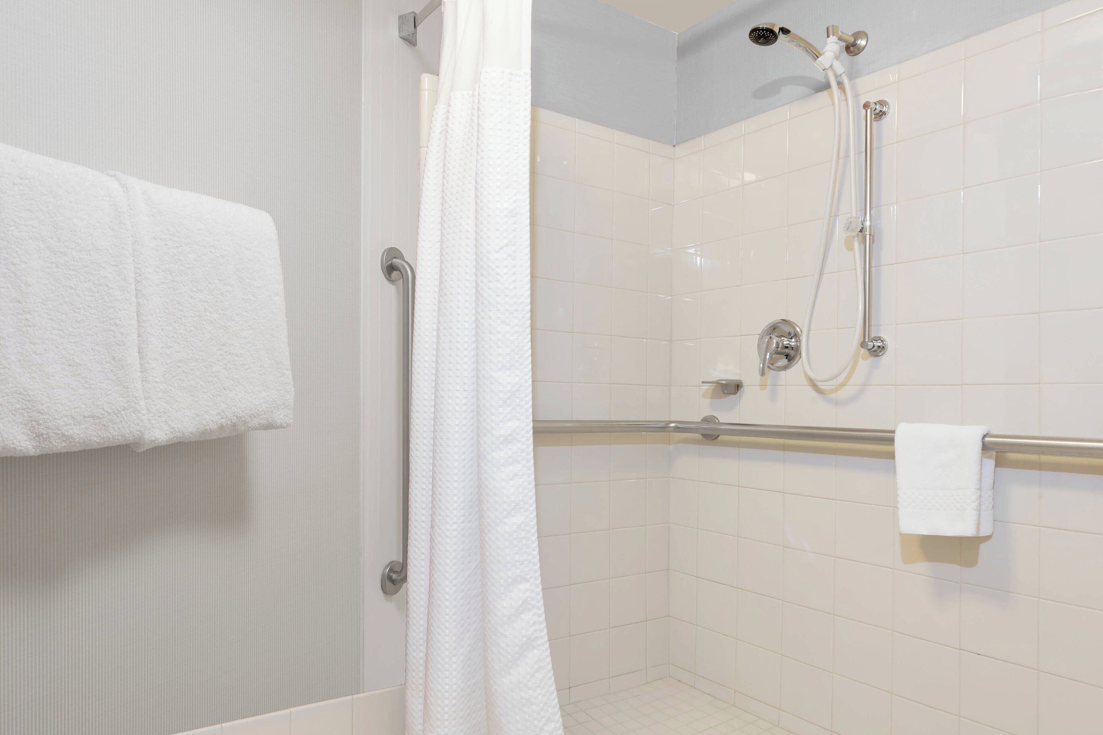 combined shower/bathtub, free toiletries, hair dryer, towels