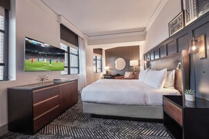 Premium bedding, down comforters, pillowtop beds, in-room safe