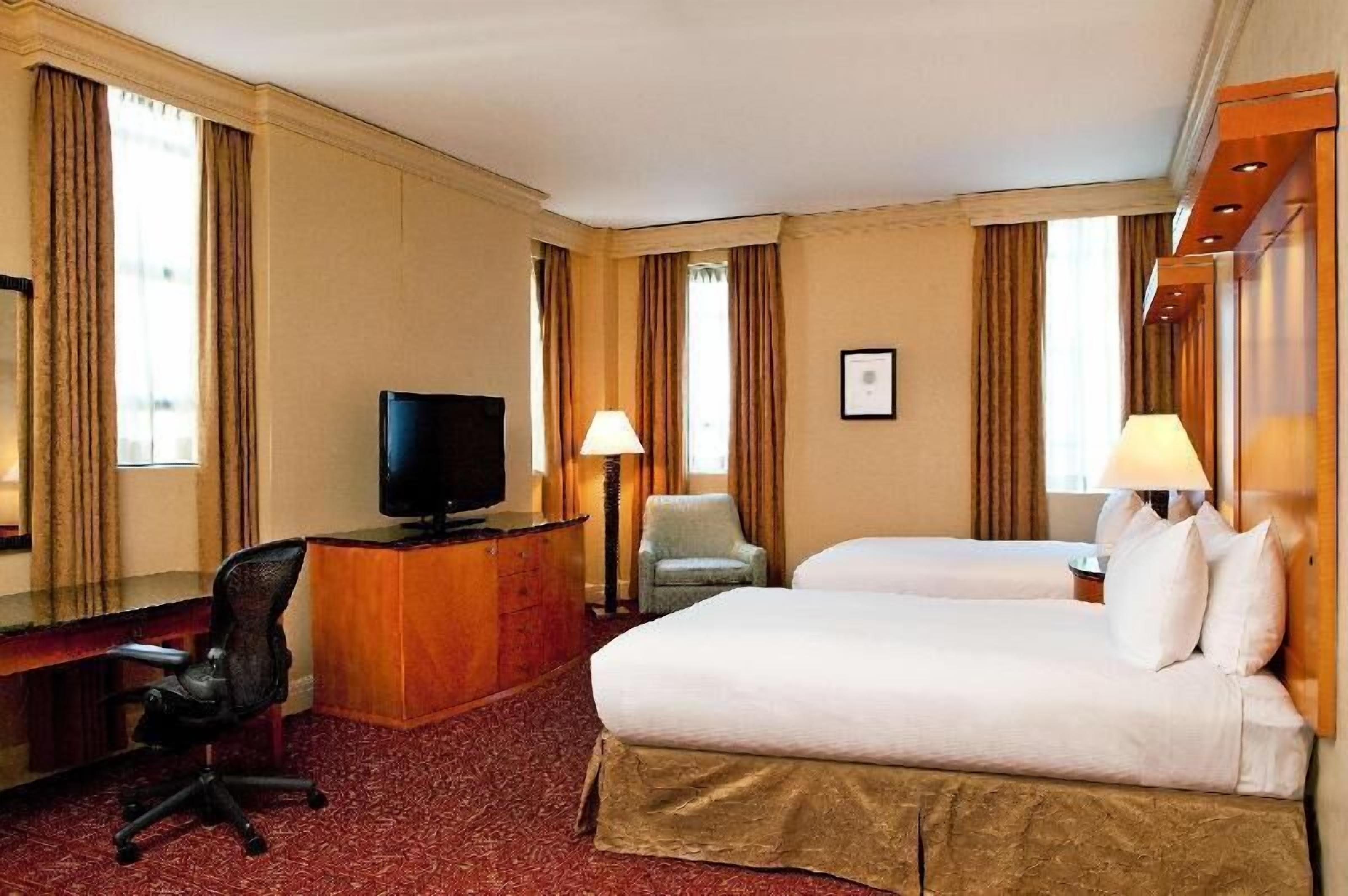Premium bedding, down comforters, pillowtop beds, in-room safe