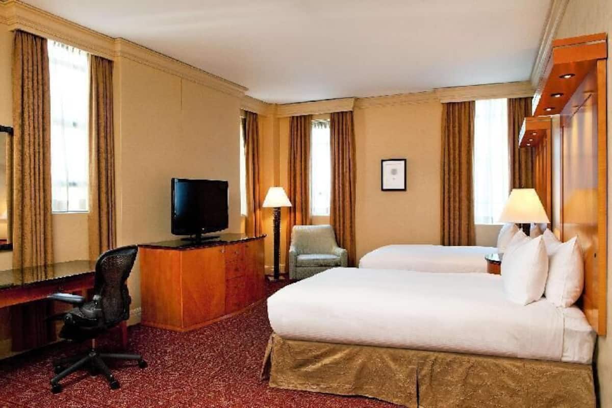 Premium bedding, down comforters, pillowtop beds, in-room safe