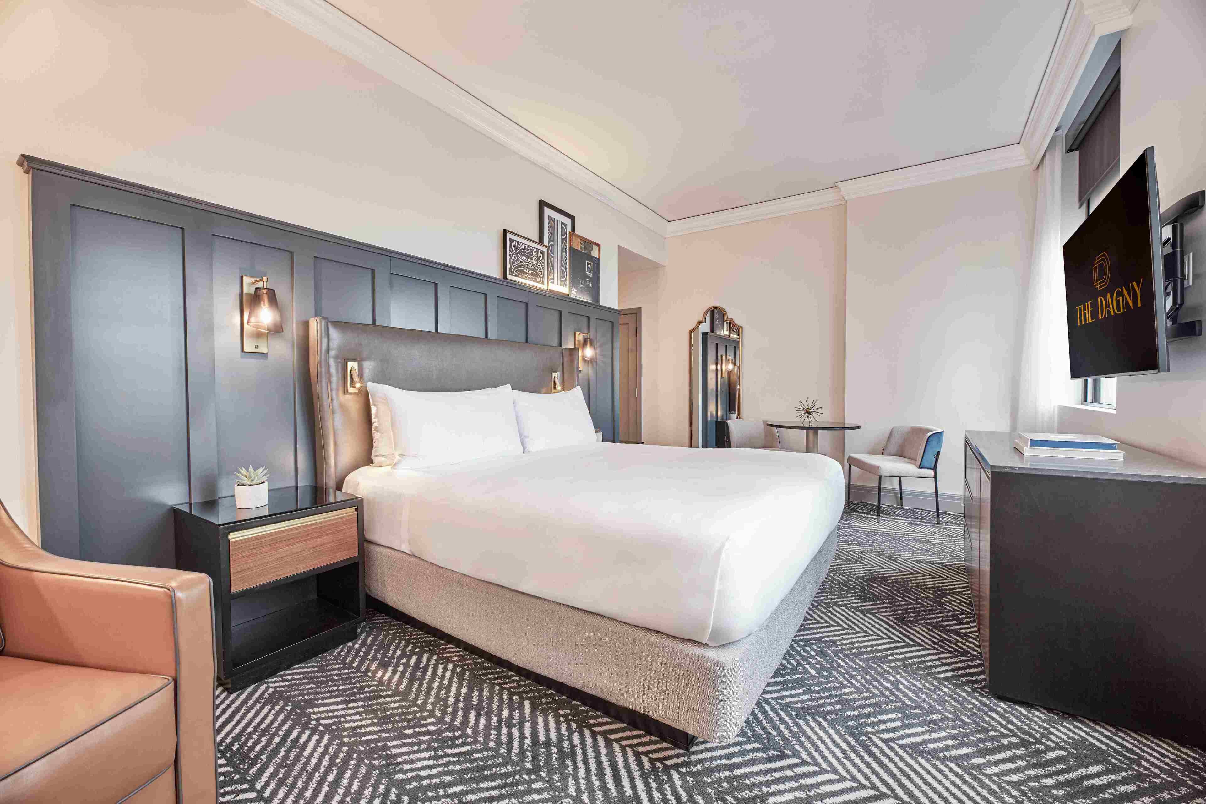 Premium bedding, down comforters, pillowtop beds, in-room safe