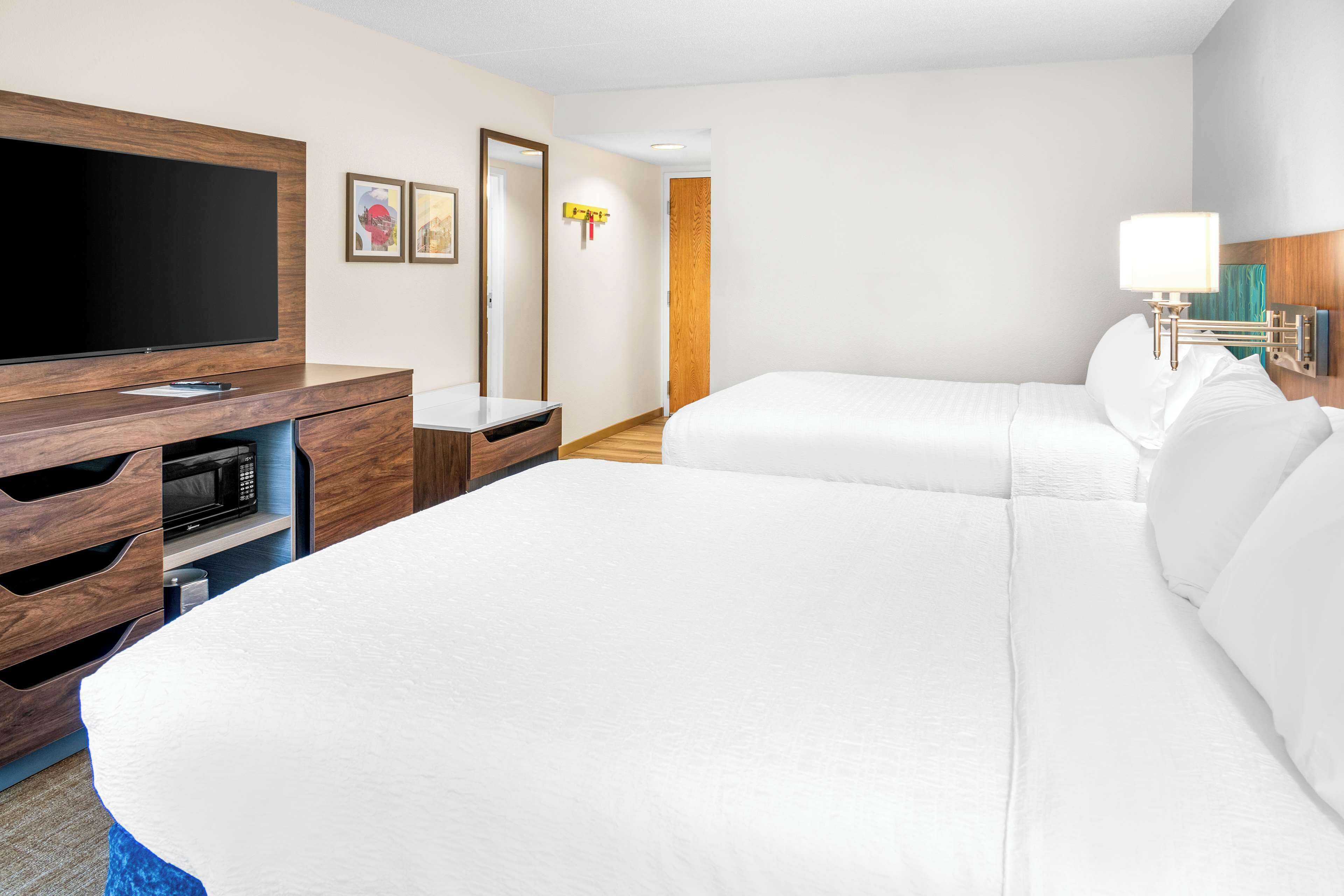room, 2 queen beds | premium bedding, pillow-top beds, in-room safe, laptop workspace