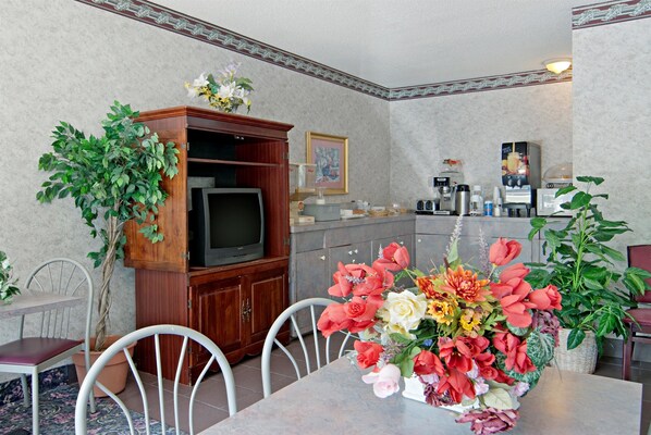 Enjoy meals in the dining area with a TV and kitchenette.