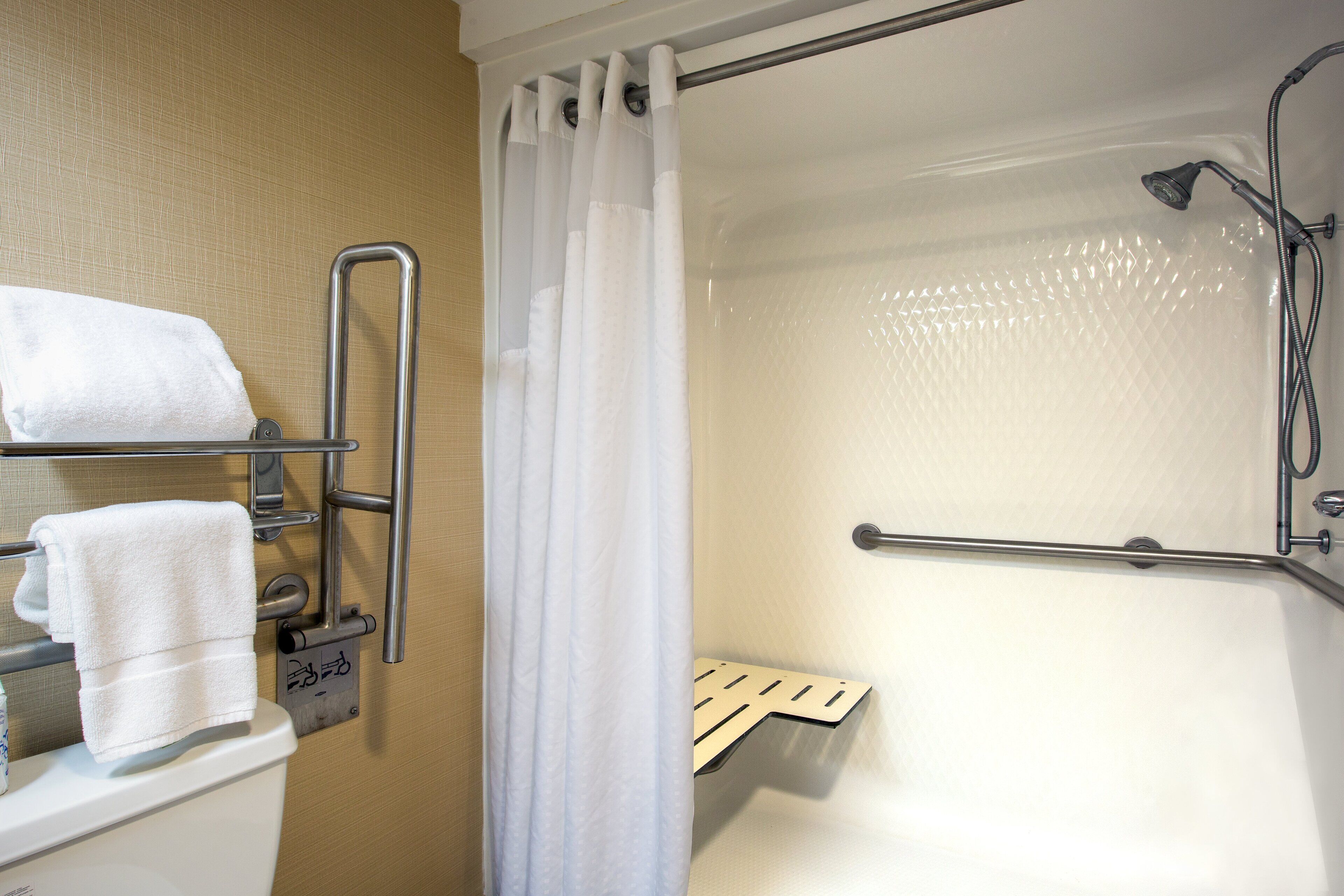 hydromassage showerhead, free toiletries, hair dryer, towels