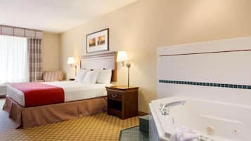 Suite, 1 King Bed, Non Smoking, Jetted Tub | Premium bedding, desk, iron/ironing board, free cots/infant beds