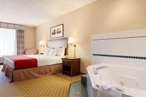 Suite, 1 King Bed, Non Smoking, Jetted Tub | Premium bedding, desk, iron/ironing board, free cots/infant beds