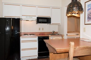 Studio, 2 Double Beds, Kitchenette | Private kitchen | Fridge, microwave, coffee/tea maker, cookware/dishes/utensils