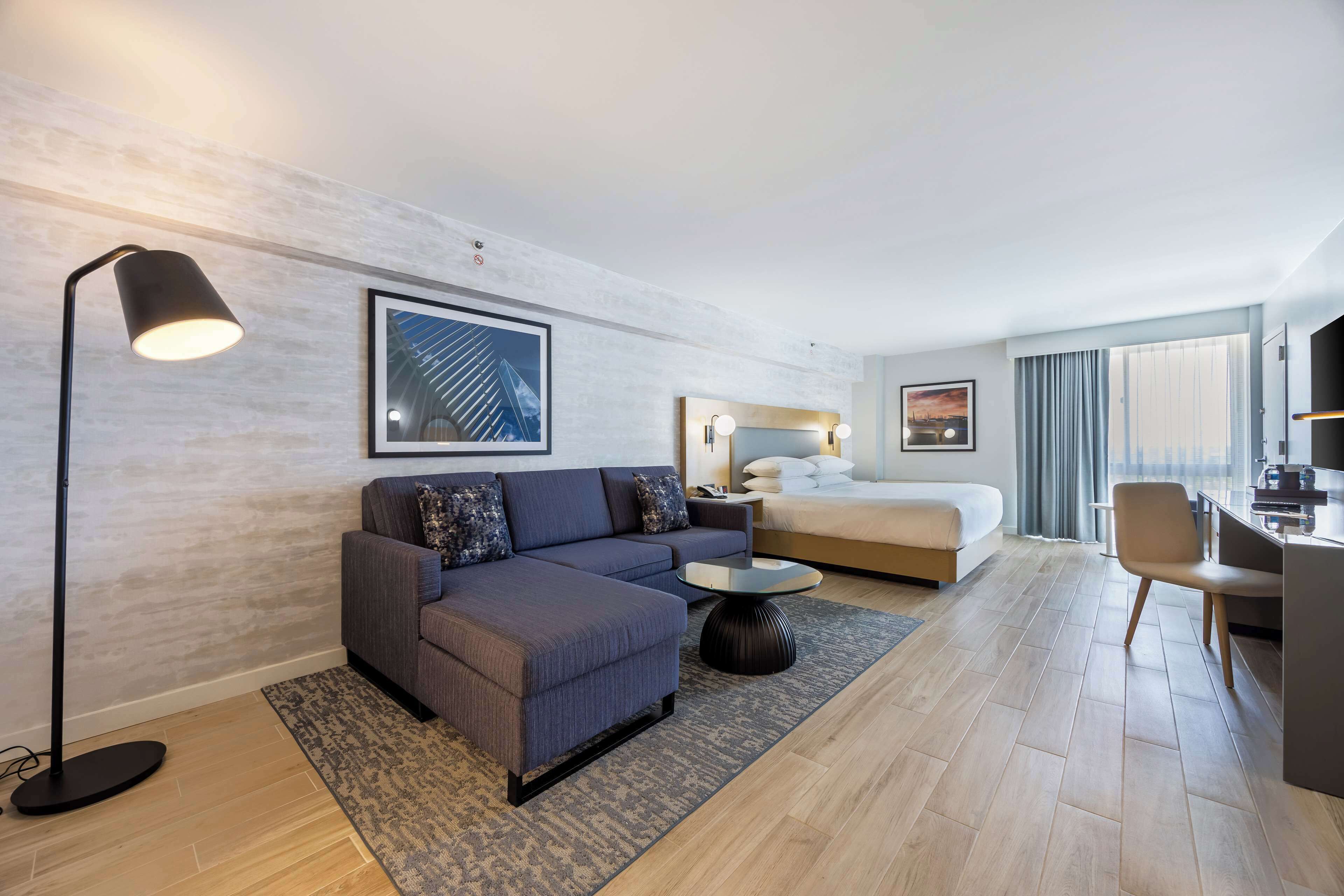 junior suite, 1 king bed | living area | tv, video game console, pay films