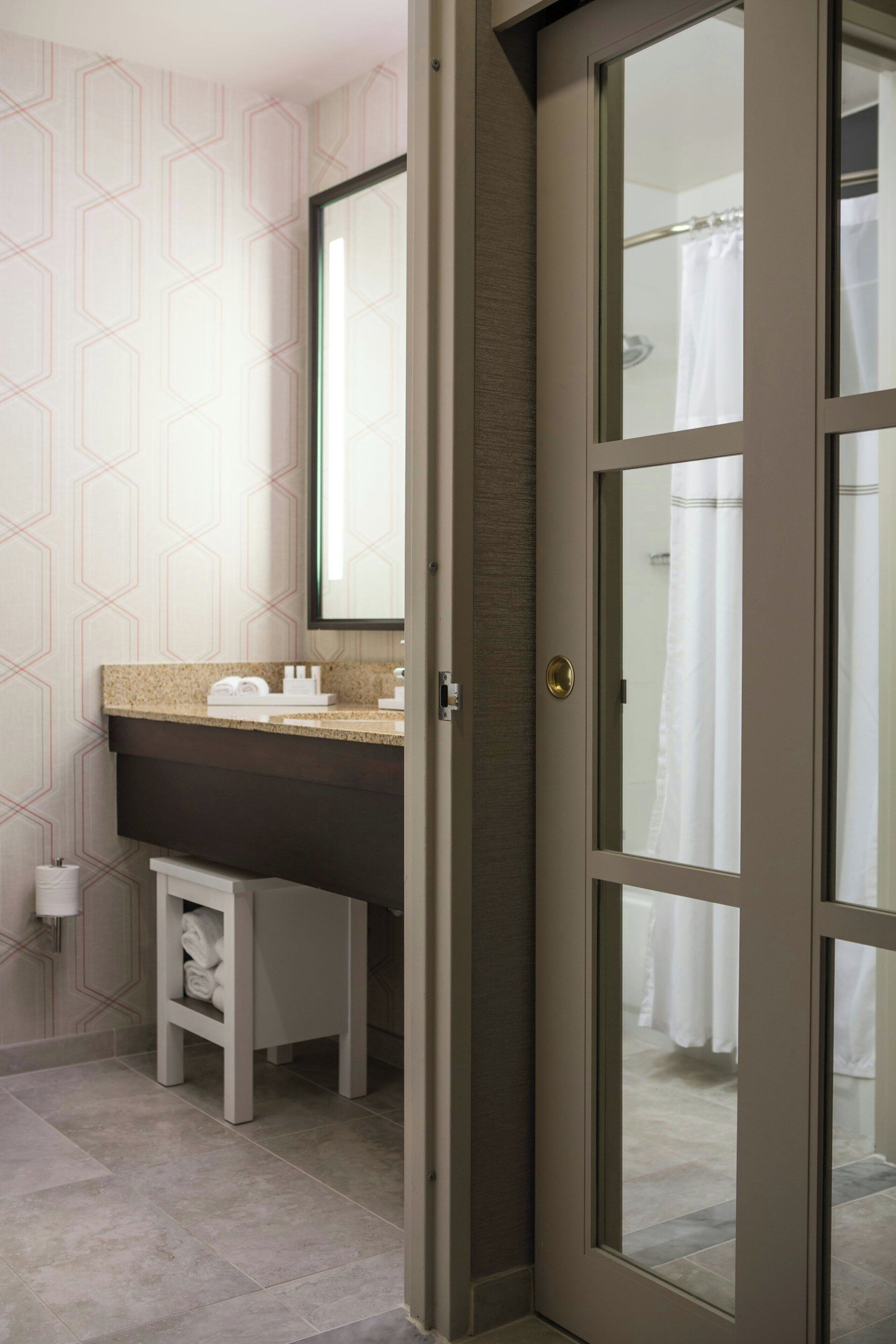 combined shower/bathtub, free toiletries, hair dryer, towels