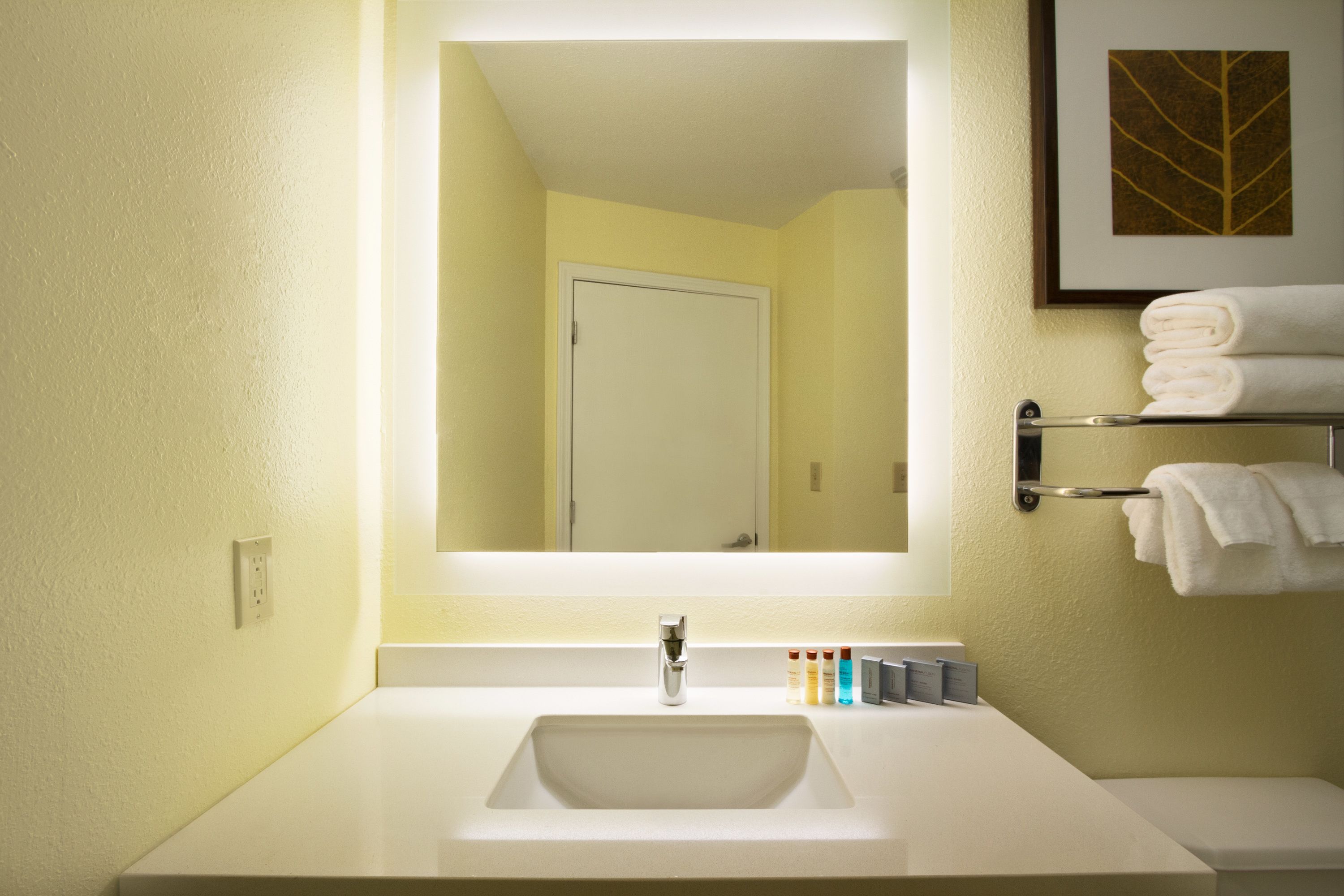 combined shower/bathtub, hair dryer, towels, soap