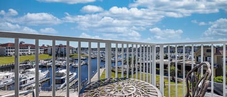 Desk, laptop workspace, iron/ironing board, free cribs/infant beds