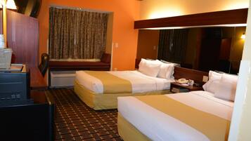 Luxe beddengoed, pillowtop-bedden, een kluis op de kamer