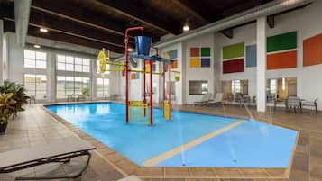Indoor pool, open 7:00 AM to 11:00 PM, pool loungers