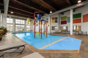 Indoor pool, open 7:00 AM to 11:00 PM, pool loungers