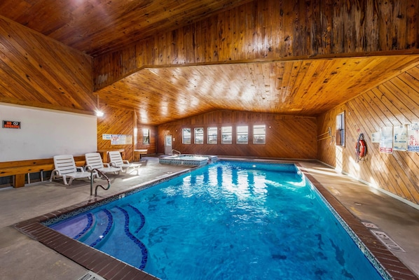 Indoor pool, open 9:00 AM to 10:00 PM, pool loungers