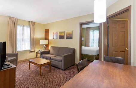 Suite, 2 Bedrooms, Non Smoking, Refrigerator & Microwave | Desk, laptop workspace, blackout drapes, iron/ironing board