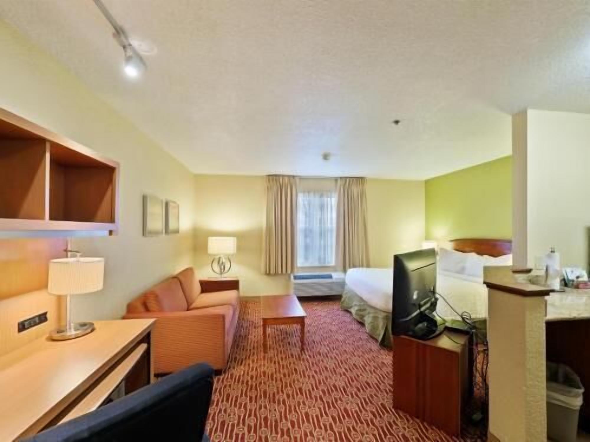 Desk, laptop workspace, blackout curtains, iron/ironing board