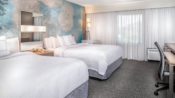 Premium bedding, pillowtop beds, desk, blackout drapes