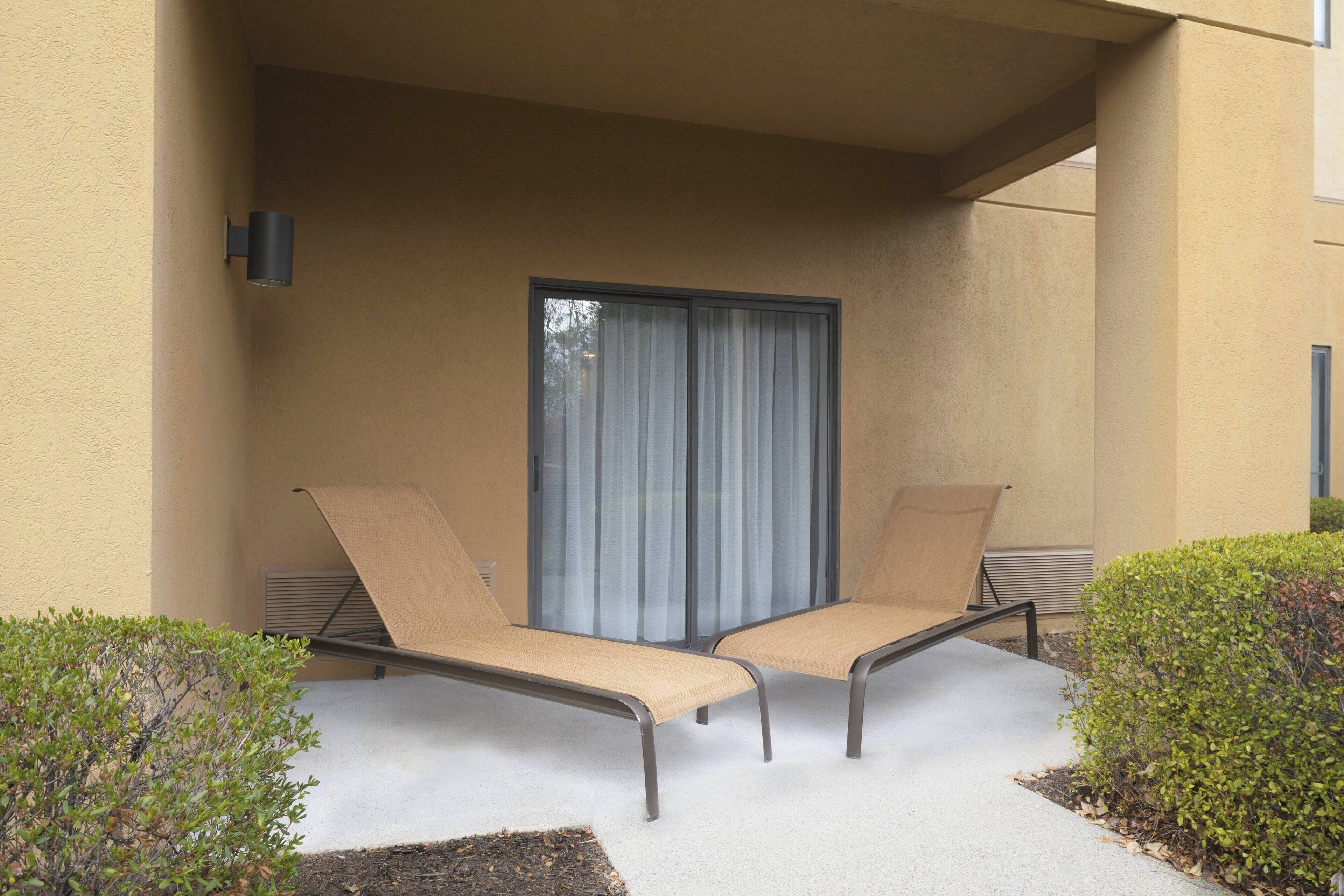 premium bedding, pillow-top beds, desk, blackout curtains