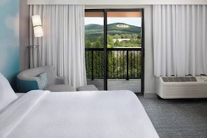 Premium bedding, pillowtop beds, desk, blackout drapes