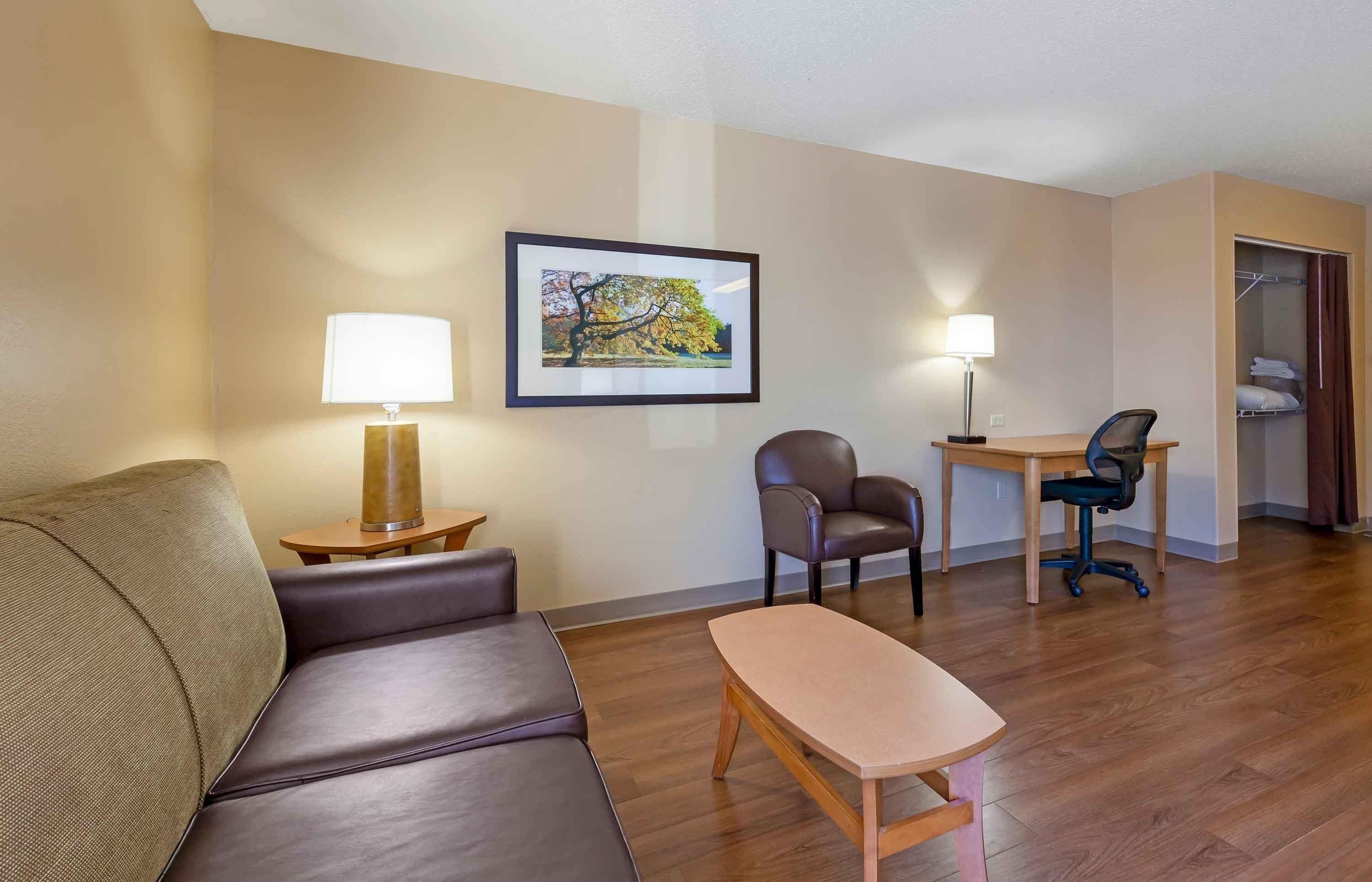 Deluxe Suite, 1 Queen Bed with Sofa bed, Non Smoking | 1 bedroom, desk, free WiFi, bed sheets