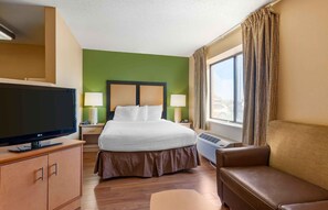 Deluxe Suite, 1 Queen Bed with Sofa bed, Non Smoking | 1 bedroom, desk, free WiFi, bed sheets