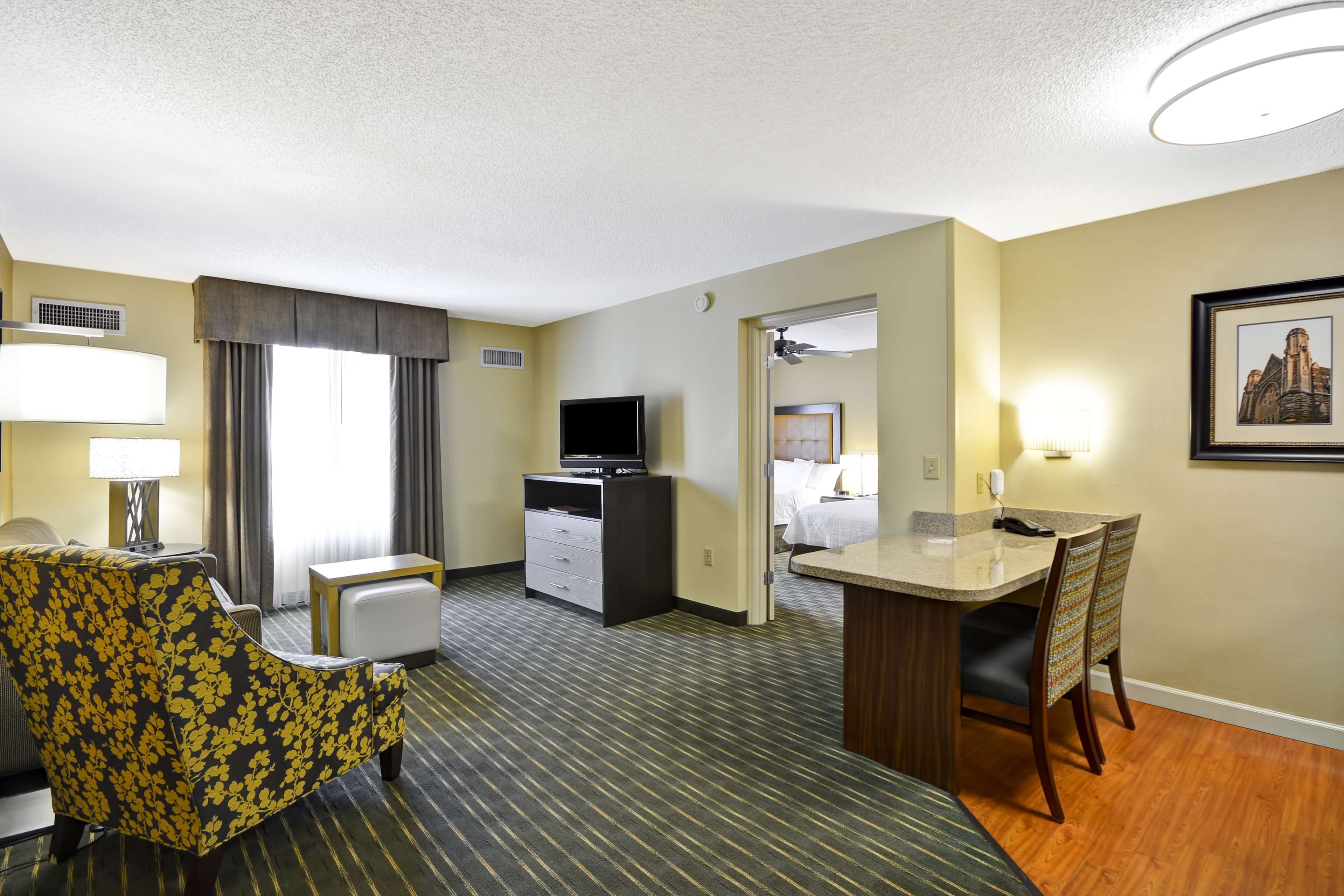 suite, 2 double beds | in-room safe, desk, iron/ironing board, free cots/infant beds