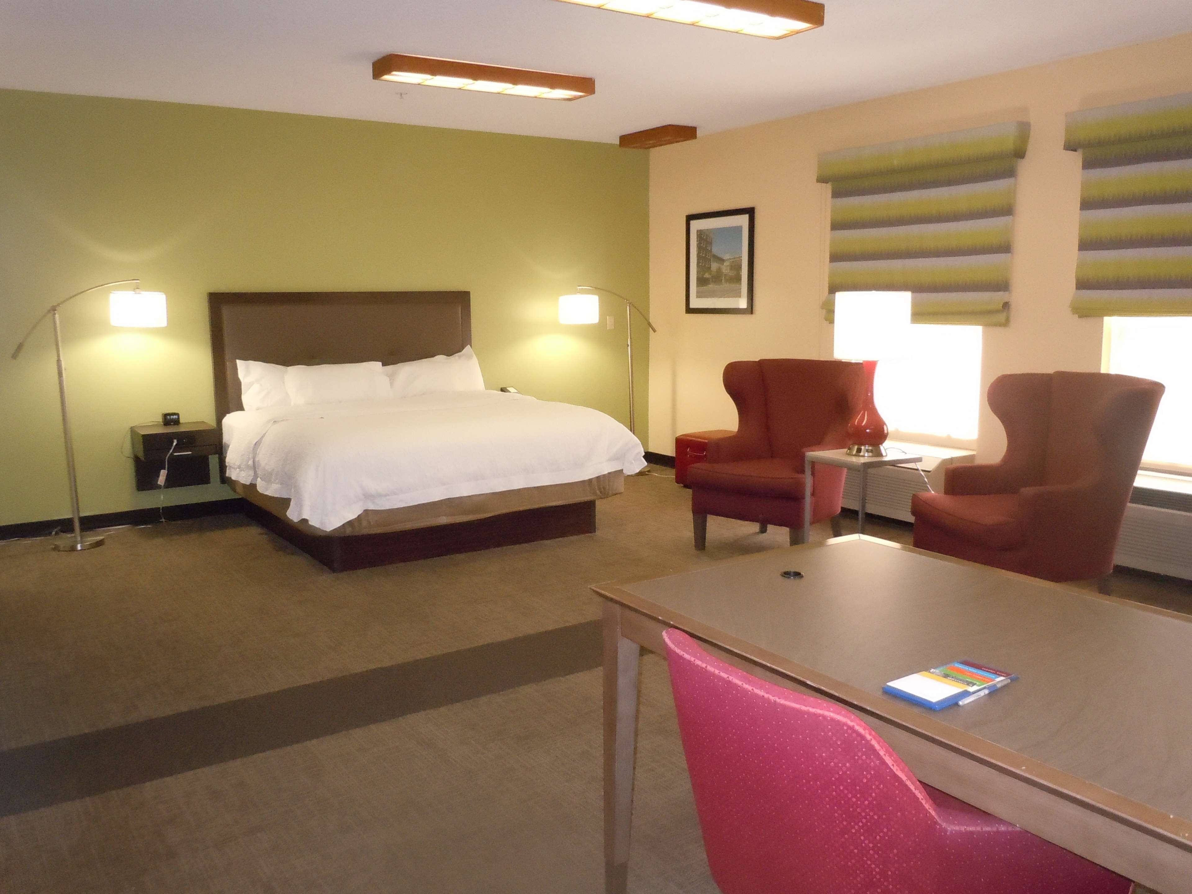 suite, 1 king bed, non smoking | in-room safe, desk, iron/ironing board, free wifi