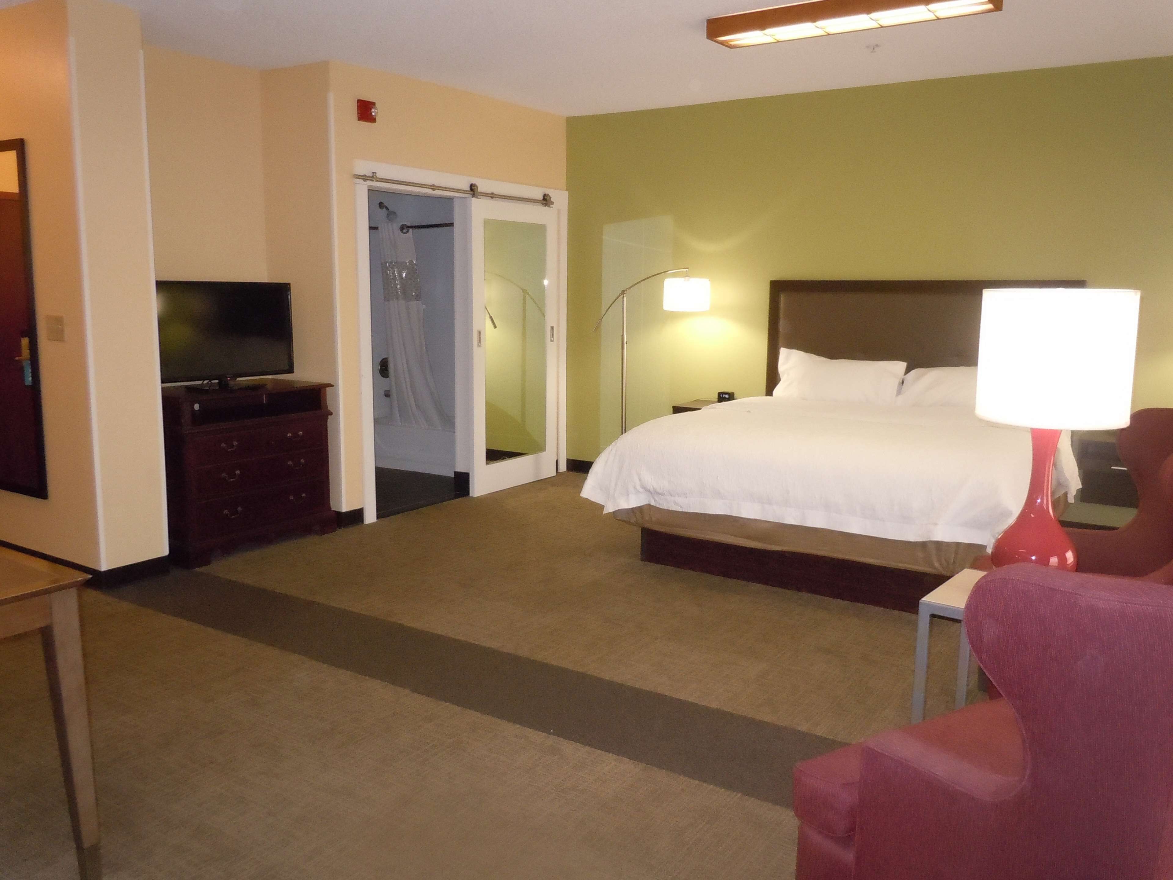 suite, 1 king bed, non smoking | in-room safe, desk, iron/ironing board, free wifi