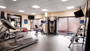 A gym with treadmills, elliptical machines, and weightlifting equipment. - Hampton Inn Morganton (Morganton)