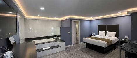 Chambre Deluxe, 1 grand lit, fumeur, bain Ă remous