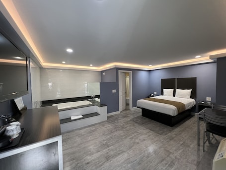 Tabla de planchar con plancha, wifi gratis y ropa de cama