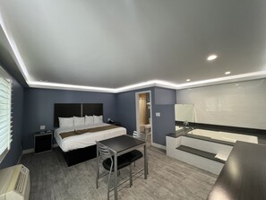 Deluxe Room, 1 King Bed, Non Smoking, Jetted Tub | Iron/ironing board, free WiFi, bed sheets