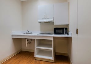 Studio, 1 Queen Bed, Accessible, Non Smoking | Private kitchenette | Fridge, microwave, stovetop