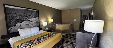 Deluxe Studio Suite, 1 King Bed, Non Smoking | Desk, laptop workspace, blackout drapes, iron/ironing board