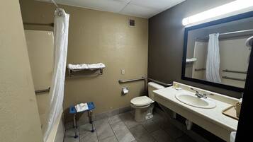 Room, 1 King Bed, Accessible, Non Smoking (Mobility) | Bathroom | Free toiletries, hair dryer, towels, soap