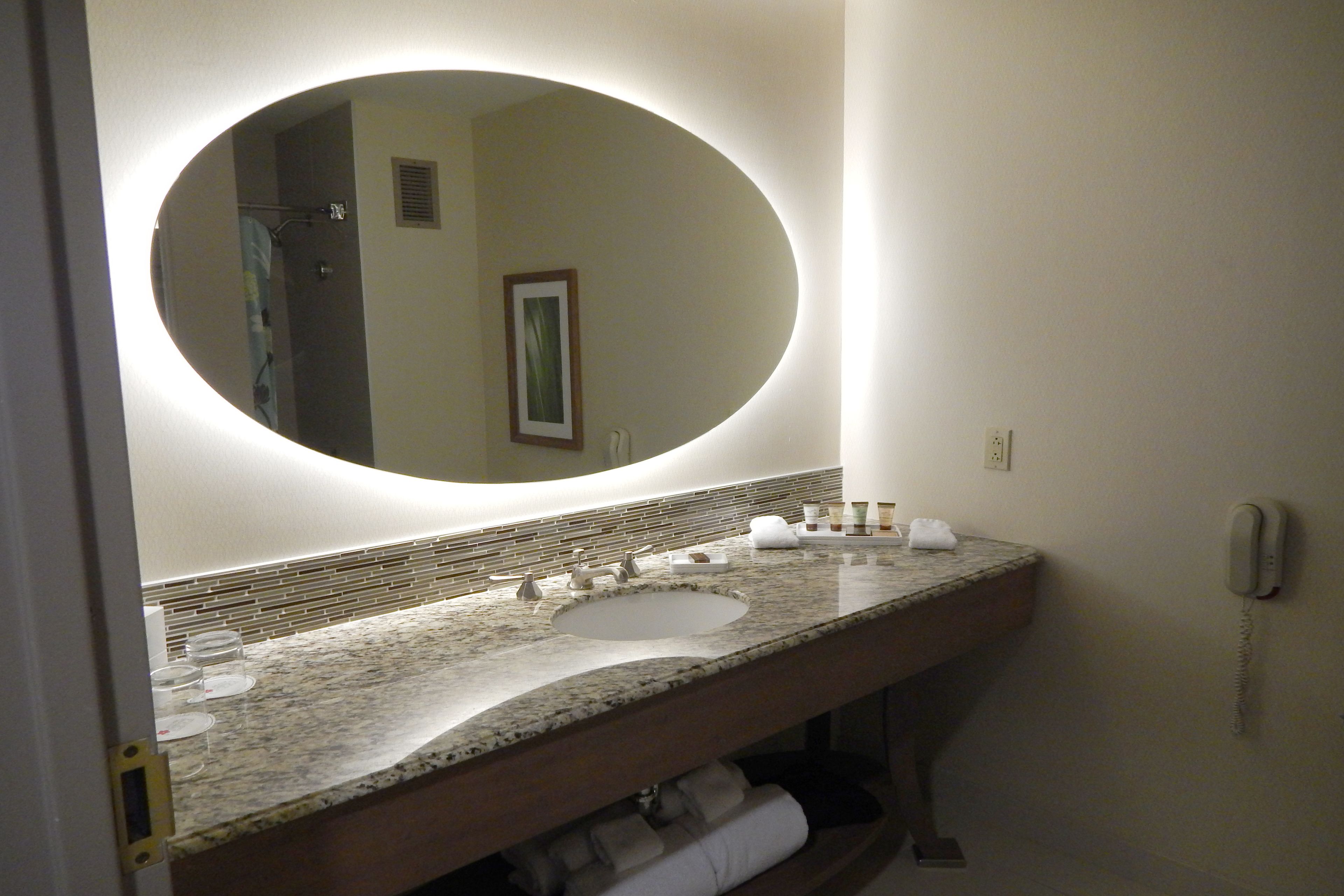 combined shower/bathtub, designer toiletries, hair dryer, bathrobes