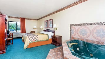 Deluxe Studio Suite, 1 King Bed, Non Smoking | Desk, iron/ironing board, free cribs/infant beds, rollaway beds
