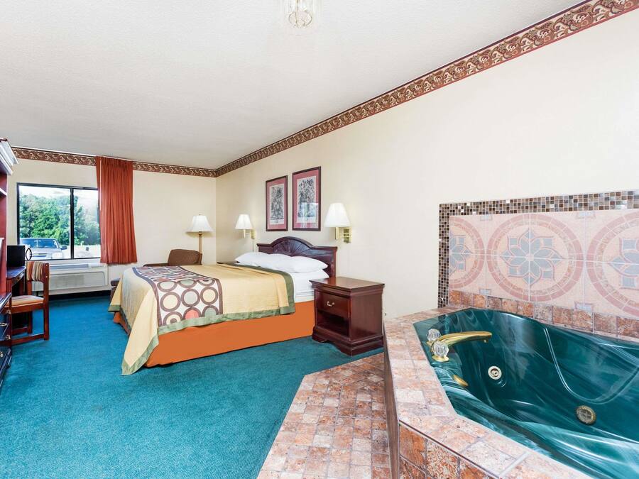 Deluxe Studio Suite, 1 King Bed, Non Smoking | Desk, iron/ironing board, free cribs/infant beds, rollaway beds