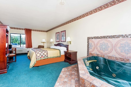 Deluxe Studio Suite, 1 King Bed, Non Smoking | Desk, iron/ironing board, free cribs/infant beds, rollaway beds