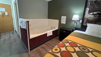 Suite, 1 King Bed, Non Smoking | Bathroom | Combined shower/tub, free toiletries, hair dryer, towels